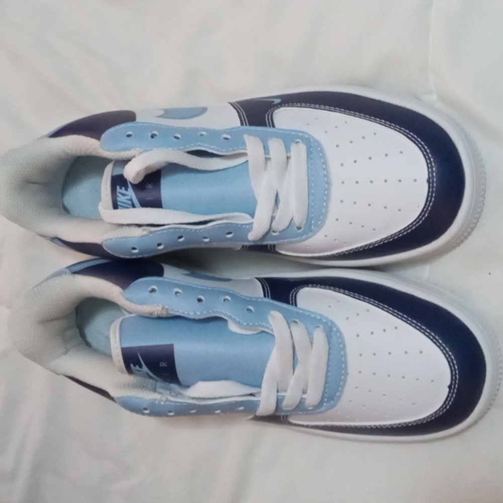 Size 7 women's Nike Air NC Tar Heel Edition